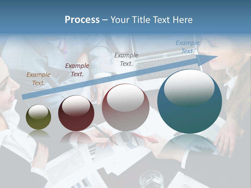 A Group Of People Sitting Around A Wooden Table PowerPoint Template