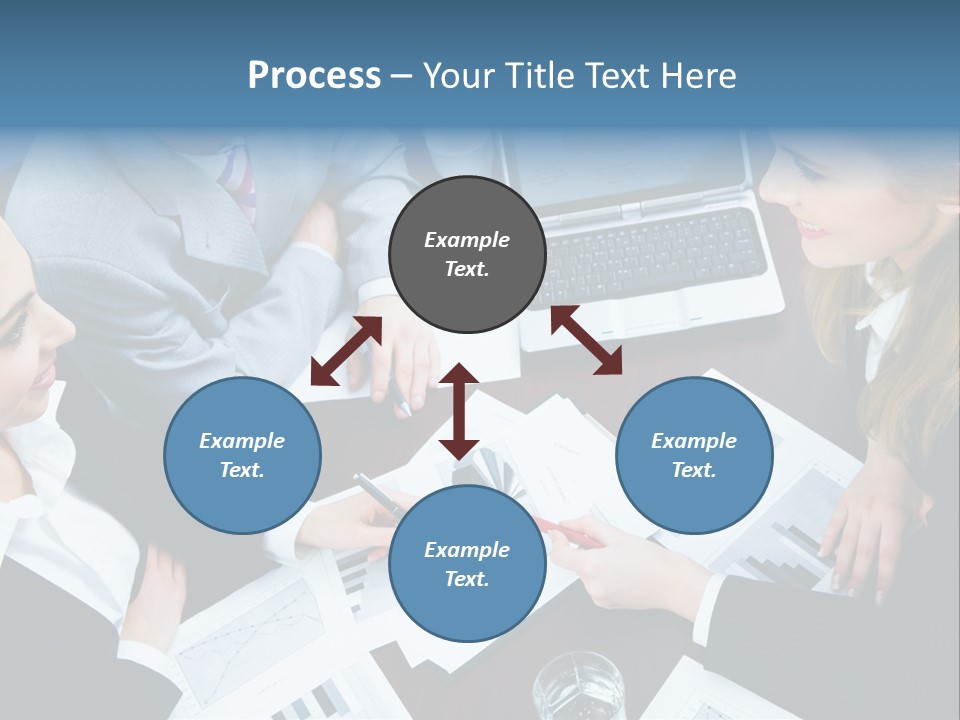 A Group Of People Sitting Around A Wooden Table PowerPoint Template
