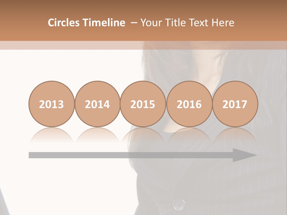 A Woman Sitting In Front Of A Laptop Computer PowerPoint Template