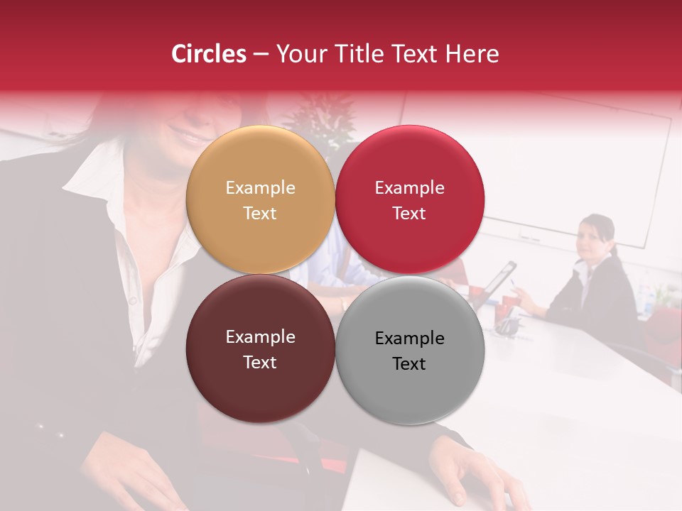 A Woman Sitting At A Table In Front Of A Group Of People PowerPoint Template