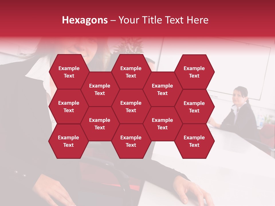 A Woman Sitting At A Table In Front Of A Group Of People PowerPoint Template