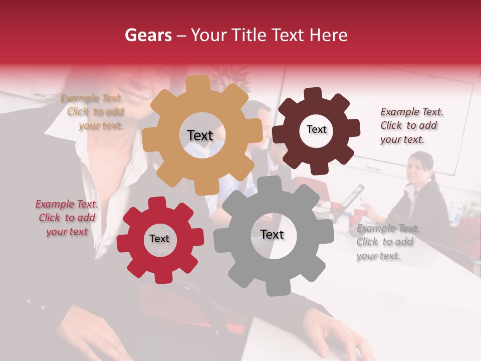 A Woman Sitting At A Table In Front Of A Group Of People PowerPoint Template