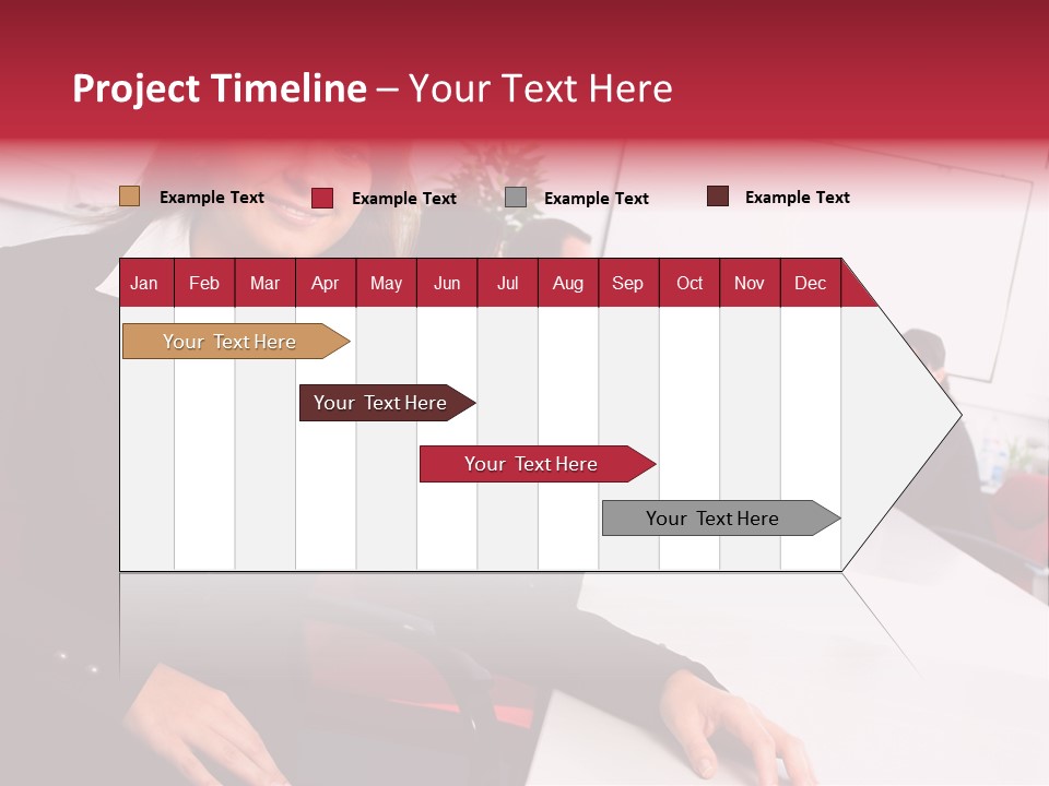 A Woman Sitting At A Table In Front Of A Group Of People PowerPoint Template
