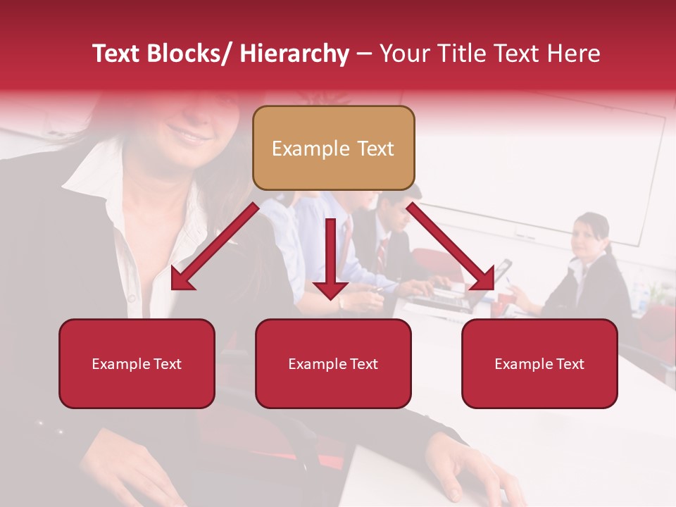 A Woman Sitting At A Table In Front Of A Group Of People PowerPoint Template
