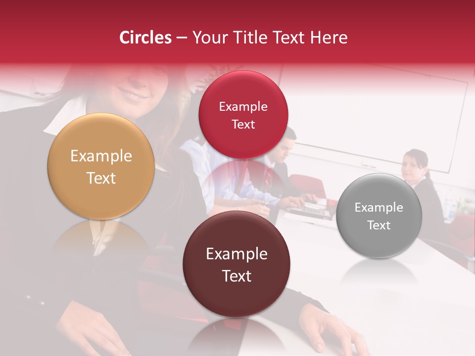 A Woman Sitting At A Table In Front Of A Group Of People PowerPoint Template