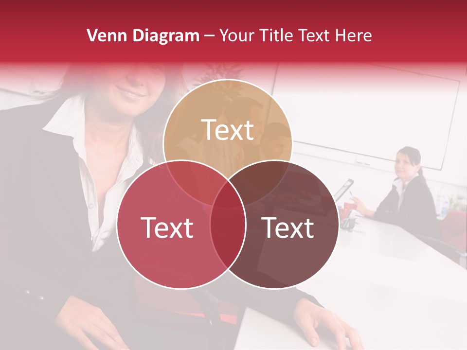 A Woman Sitting At A Table In Front Of A Group Of People PowerPoint Template