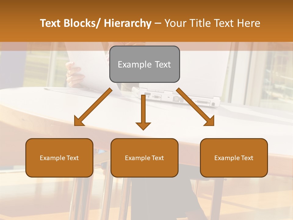 A Woman Sitting At A Table Using A Laptop Computer PowerPoint Template