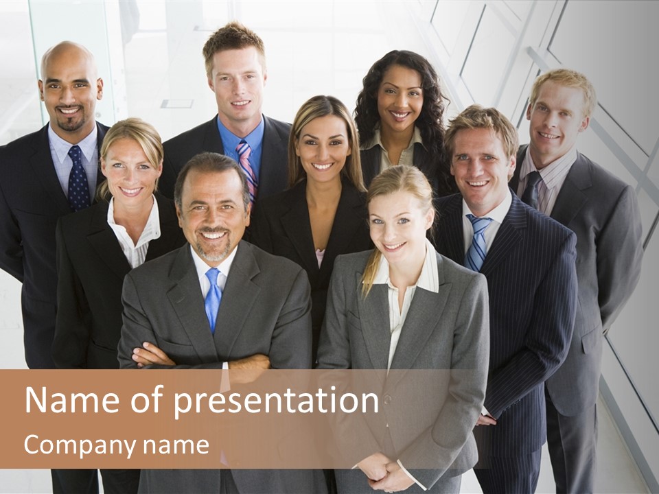 A Group Of Business People Posing For A Picture PowerPoint Template