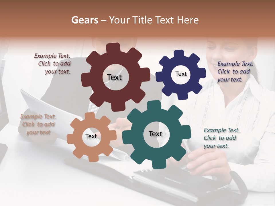 A Man And A Woman Sitting At A Table With Papers PowerPoint Template