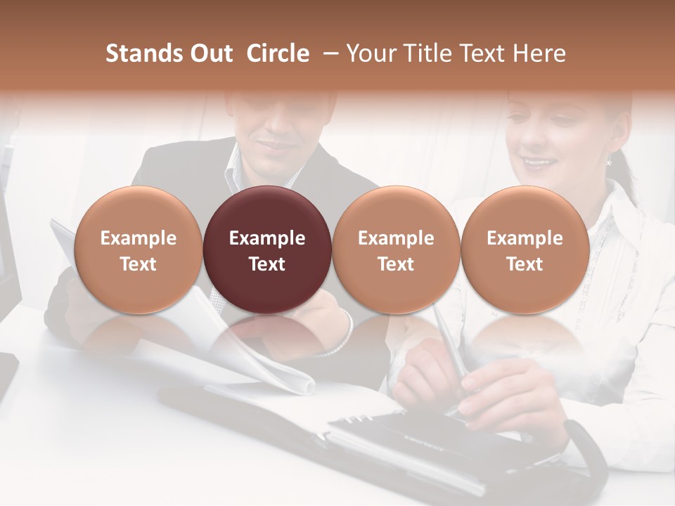 A Man And A Woman Sitting At A Table With Papers PowerPoint Template