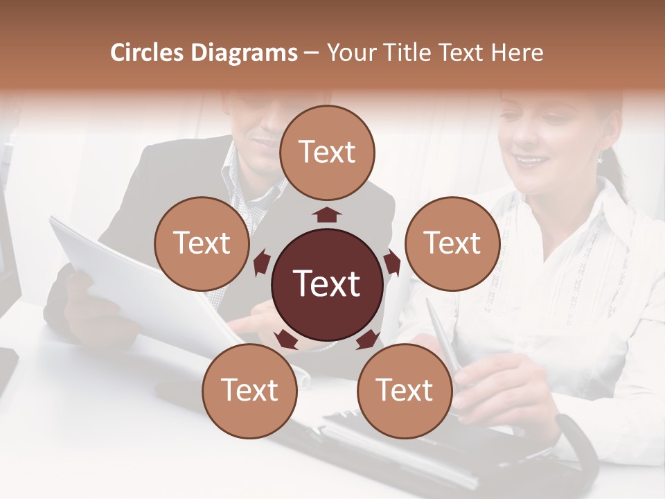 A Man And A Woman Sitting At A Table With Papers PowerPoint Template