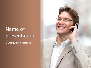 A Man In A Suit Talking On A Cell Phone PowerPoint Template