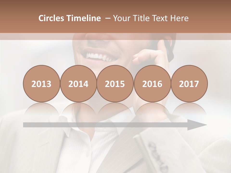 A Man In A Suit Talking On A Cell Phone PowerPoint Template