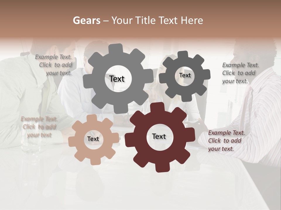 A Group Of People Sitting Around A Conference Table PowerPoint Template