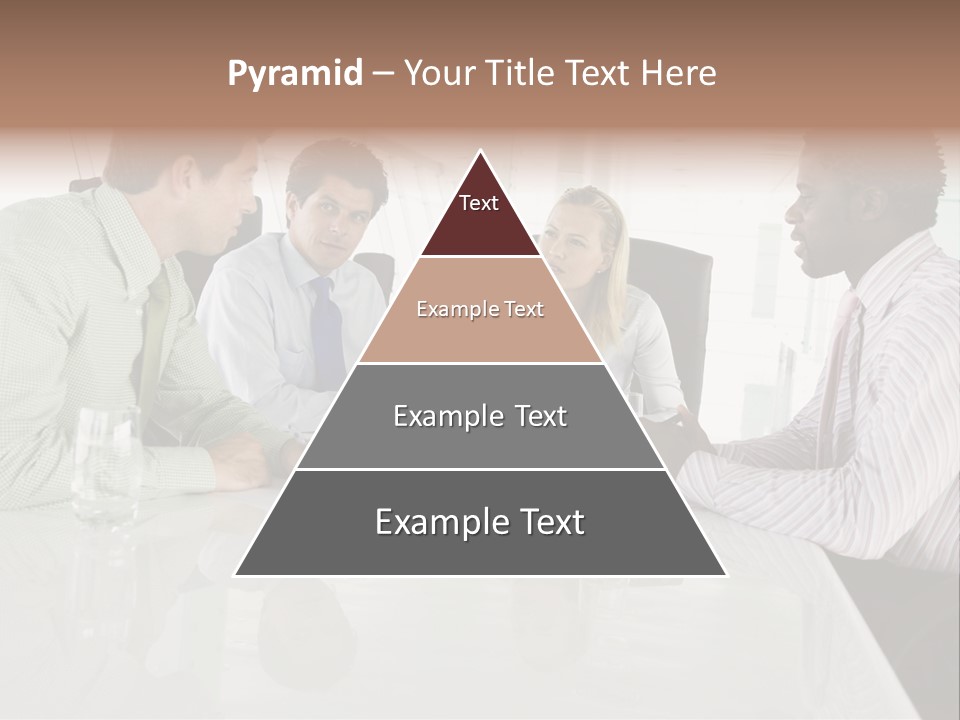 A Group Of People Sitting Around A Conference Table PowerPoint Template