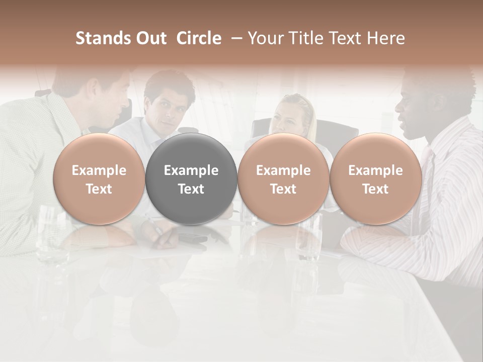 A Group Of People Sitting Around A Conference Table PowerPoint Template