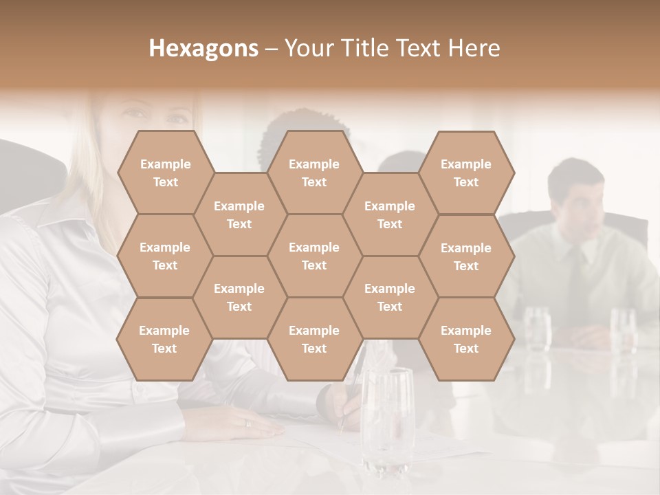 A Group Of People Sitting Around A Conference Table PowerPoint Template