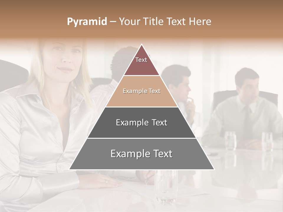 A Group Of People Sitting Around A Conference Table PowerPoint Template