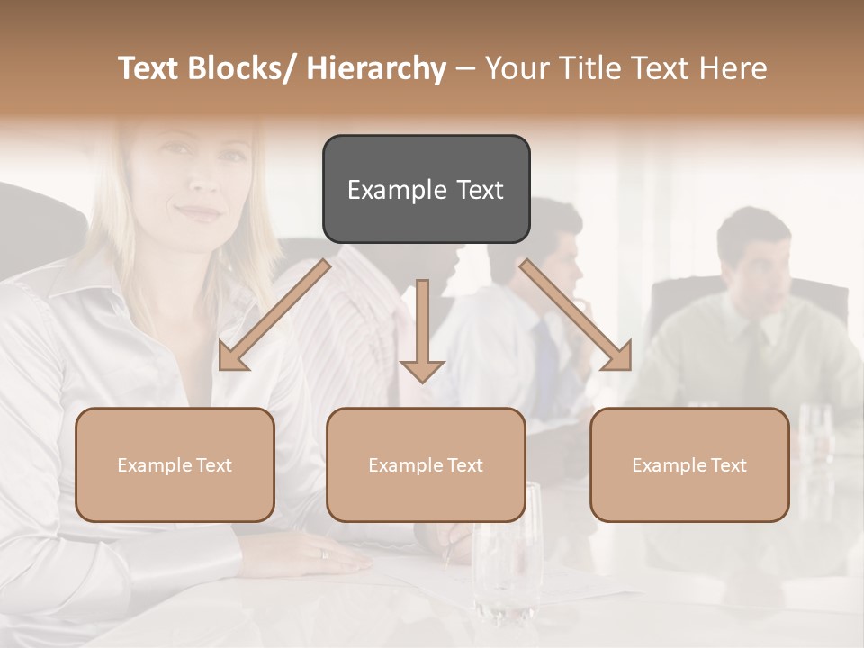 A Group Of People Sitting Around A Conference Table PowerPoint Template