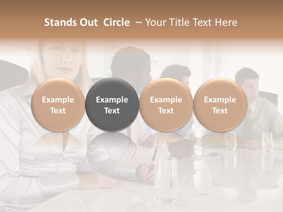 A Group Of People Sitting Around A Conference Table PowerPoint Template