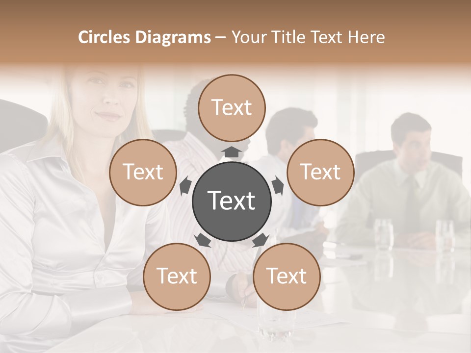 A Group Of People Sitting Around A Conference Table PowerPoint Template