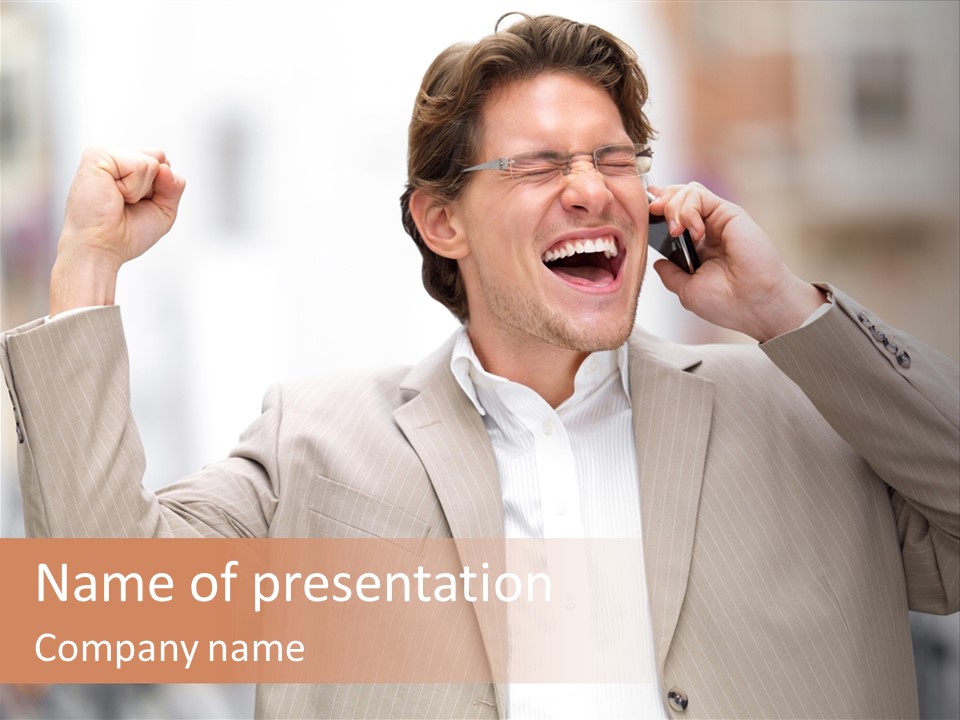 A Man In A Suit Talking On A Cell Phone PowerPoint Template