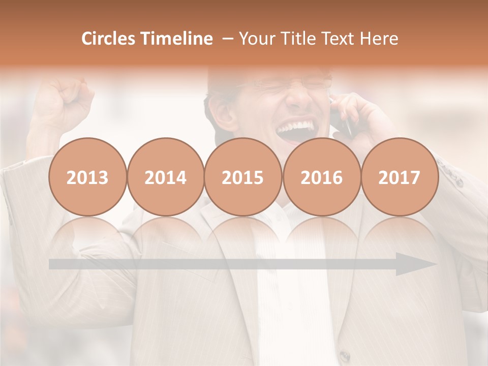 A Man In A Suit Talking On A Cell Phone PowerPoint Template