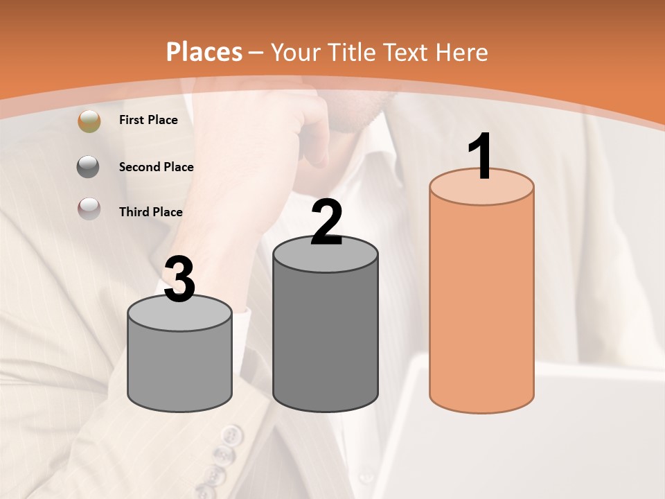 A Man Sitting In Front Of A Laptop Computer PowerPoint Template