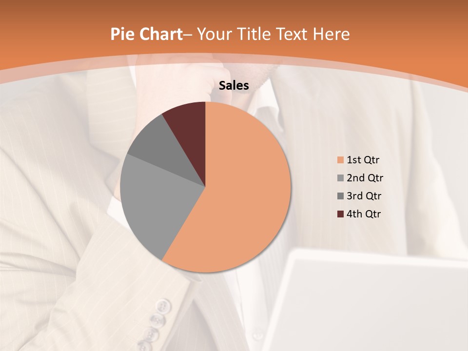 A Man Sitting In Front Of A Laptop Computer PowerPoint Template