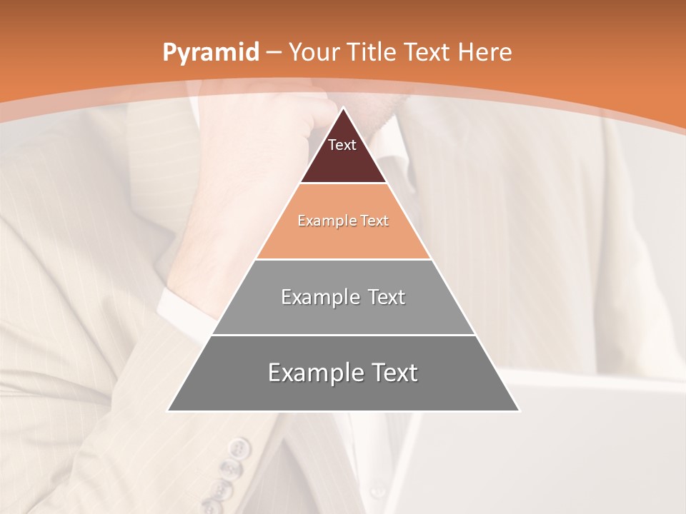 A Man Sitting In Front Of A Laptop Computer PowerPoint Template
