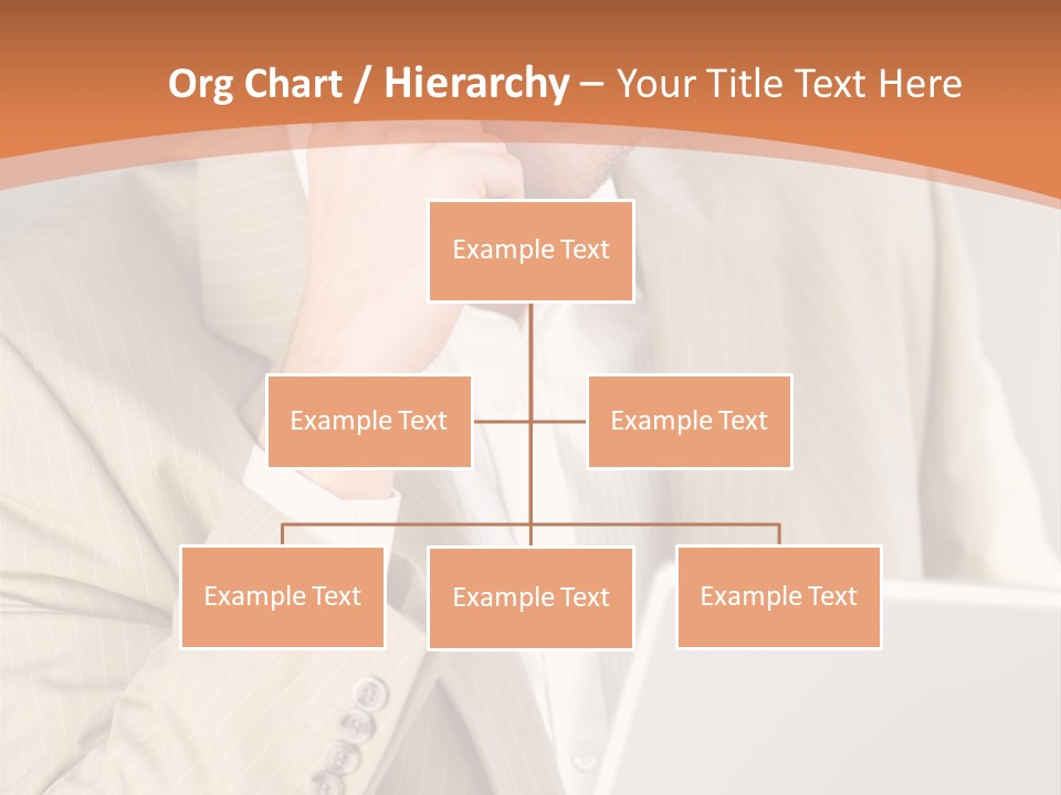 A Man Sitting In Front Of A Laptop Computer PowerPoint Template