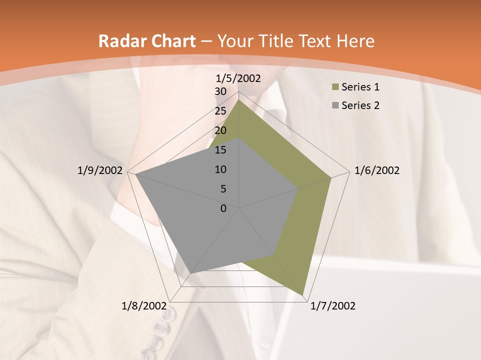 A Man Sitting In Front Of A Laptop Computer PowerPoint Template