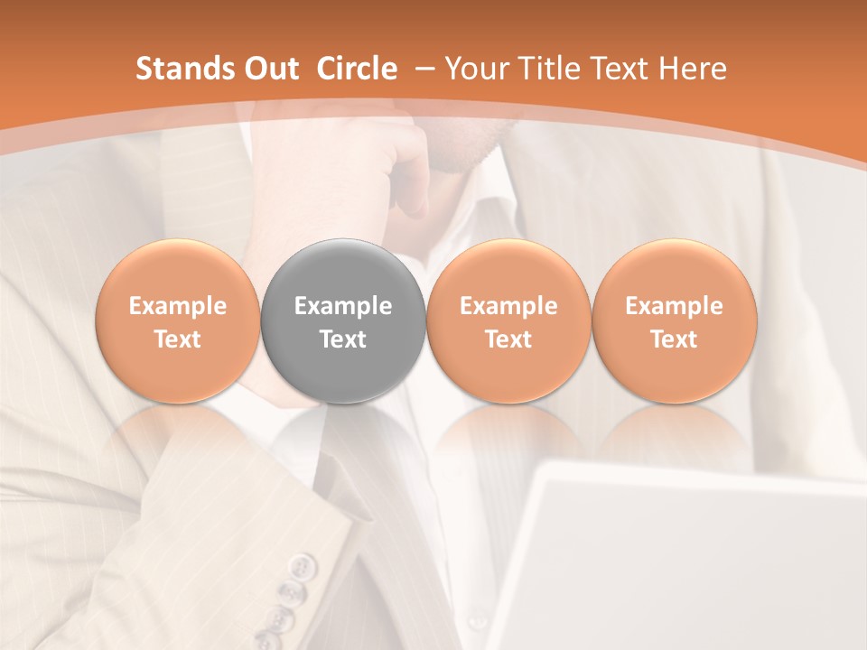 A Man Sitting In Front Of A Laptop Computer PowerPoint Template