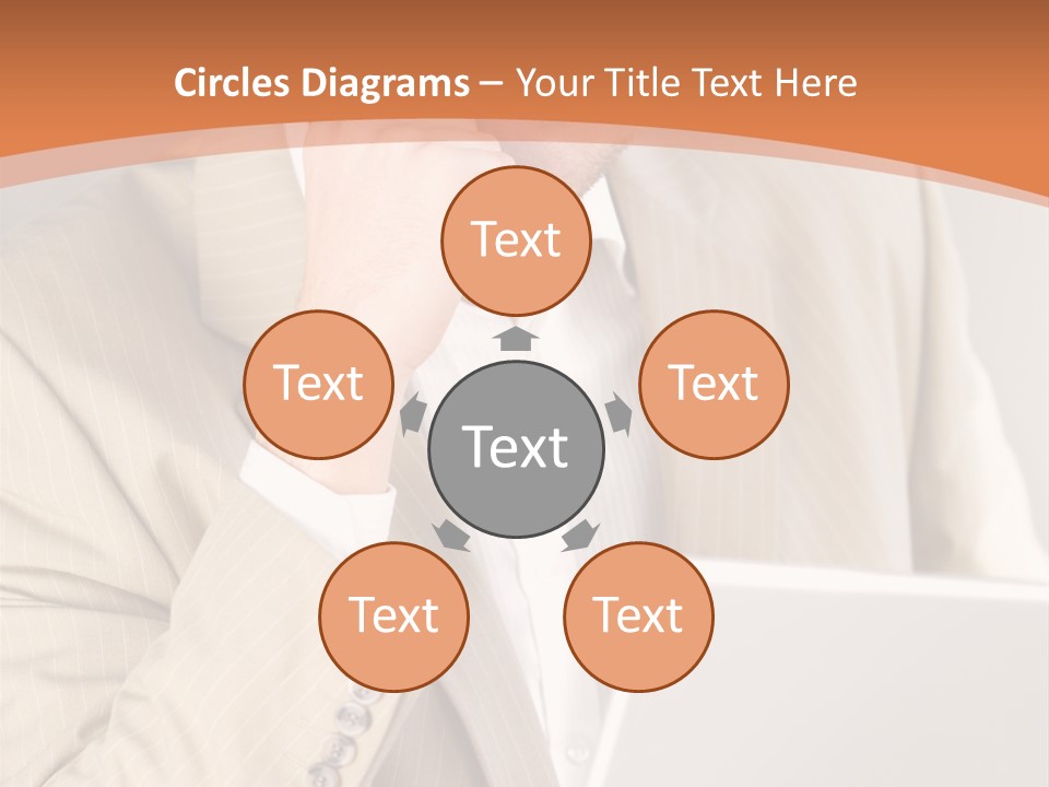 A Man Sitting In Front Of A Laptop Computer PowerPoint Template