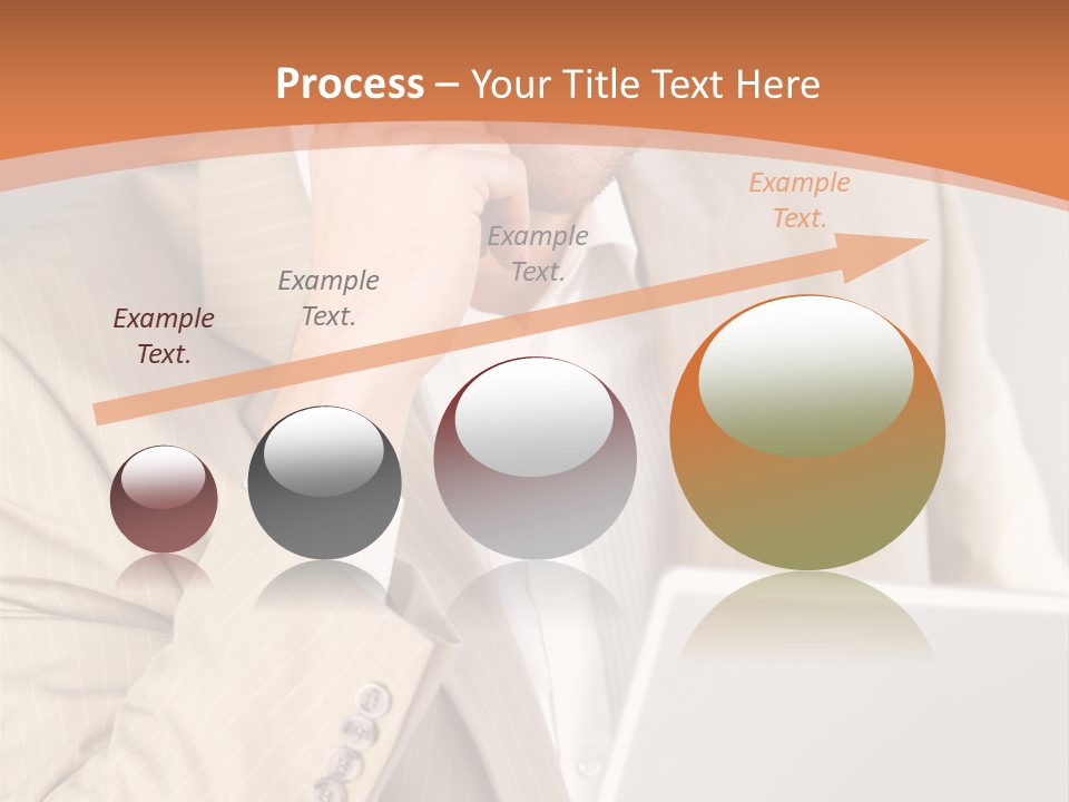 A Man Sitting In Front Of A Laptop Computer PowerPoint Template