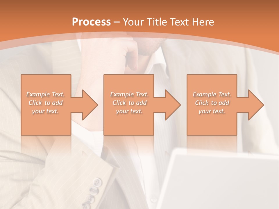 A Man Sitting In Front Of A Laptop Computer PowerPoint Template