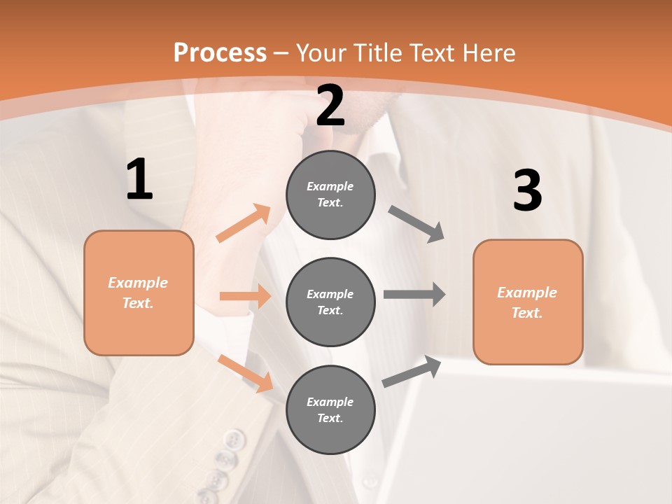 A Man Sitting In Front Of A Laptop Computer PowerPoint Template