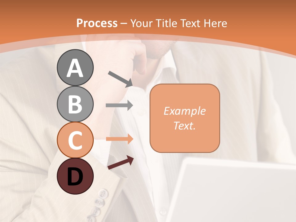A Man Sitting In Front Of A Laptop Computer PowerPoint Template