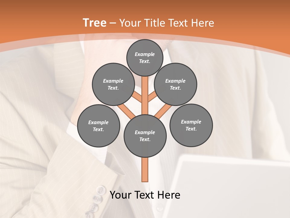 A Man Sitting In Front Of A Laptop Computer PowerPoint Template