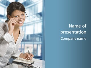 A Woman Sitting At A Desk Writing On A Piece Of Paper PowerPoint Template