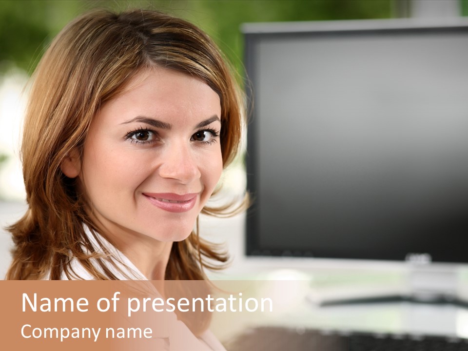 A Woman Is Smiling In Front Of A Computer PowerPoint Template