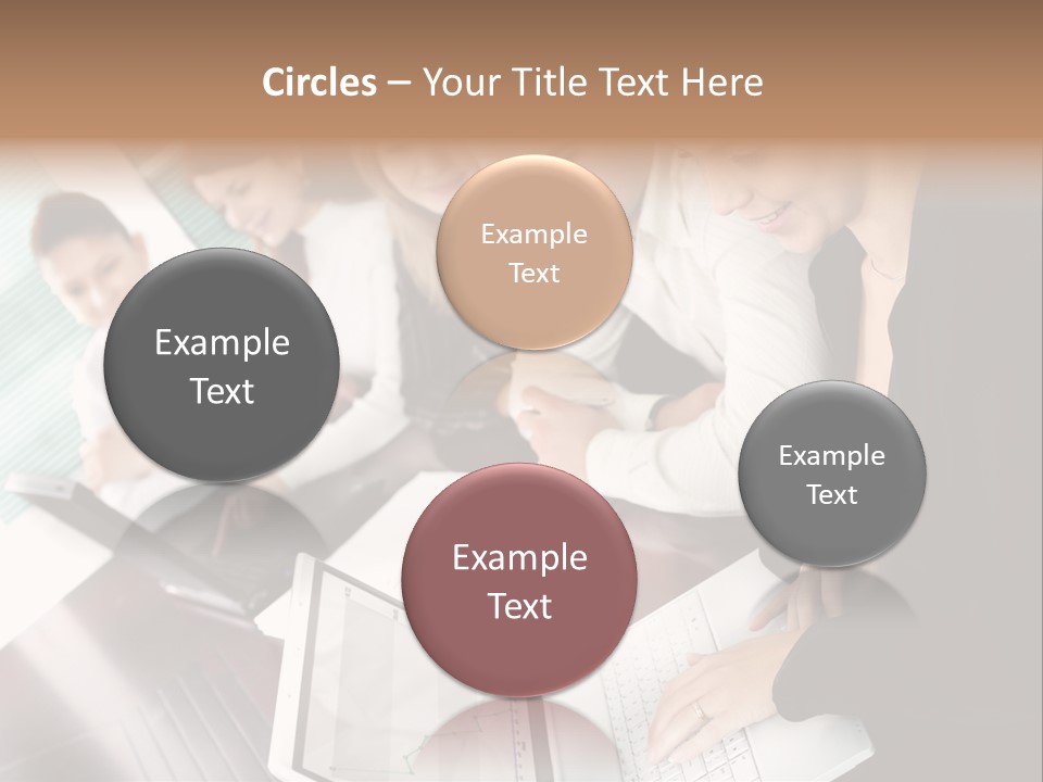 A Group Of People Sitting At A Table With Laptops PowerPoint Template