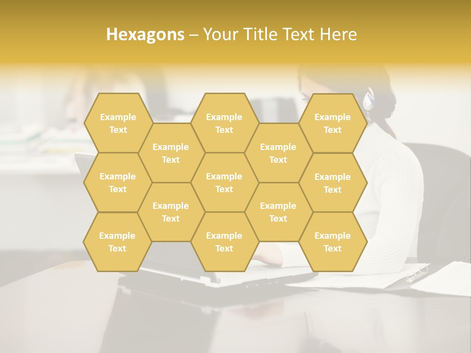 A Woman Sitting At A Desk Using A Laptop Computer PowerPoint Template