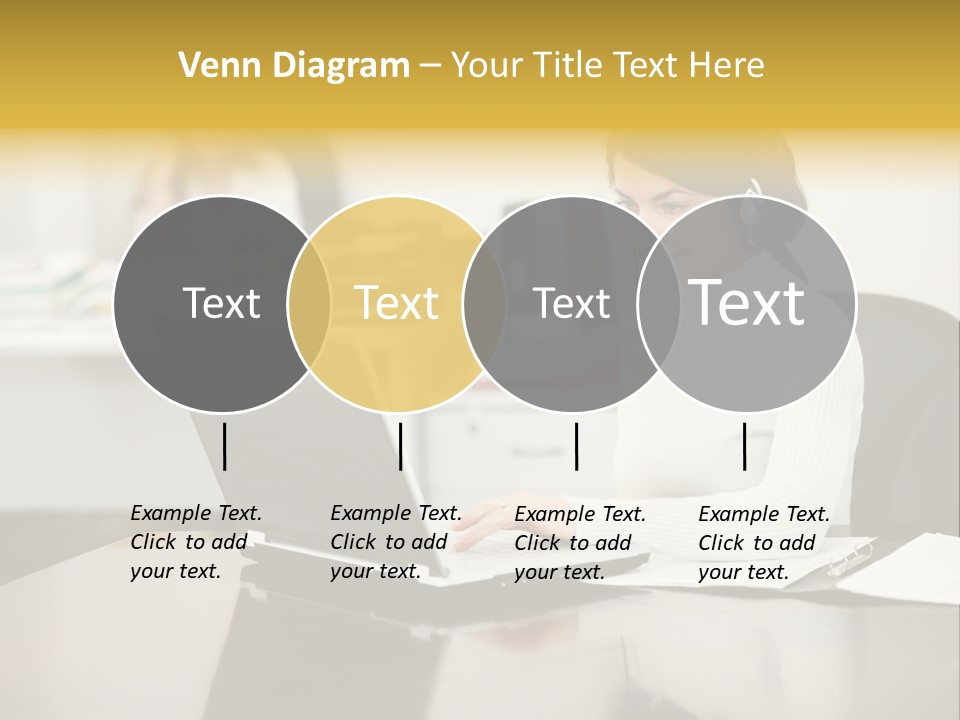 A Woman Sitting At A Desk Using A Laptop Computer PowerPoint Template