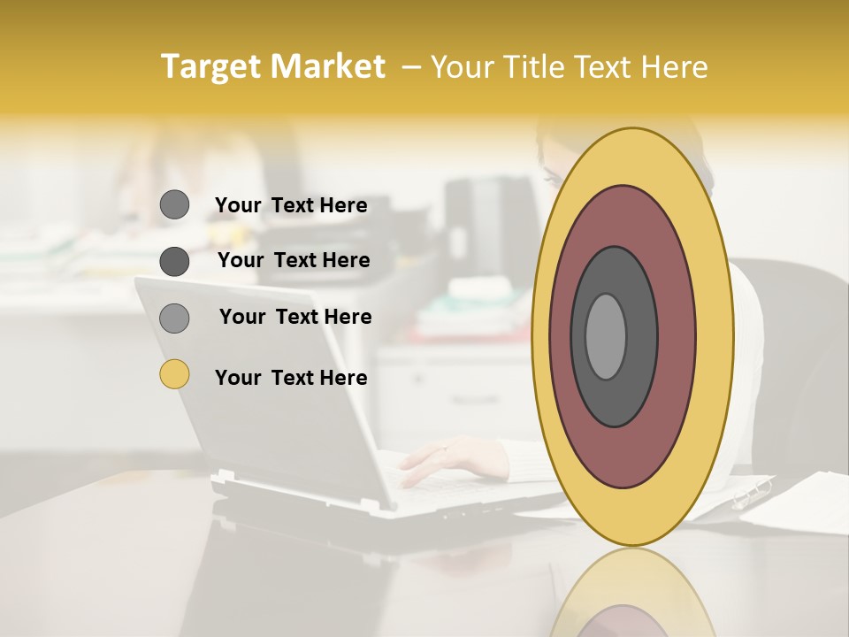 A Woman Sitting At A Desk Using A Laptop Computer PowerPoint Template