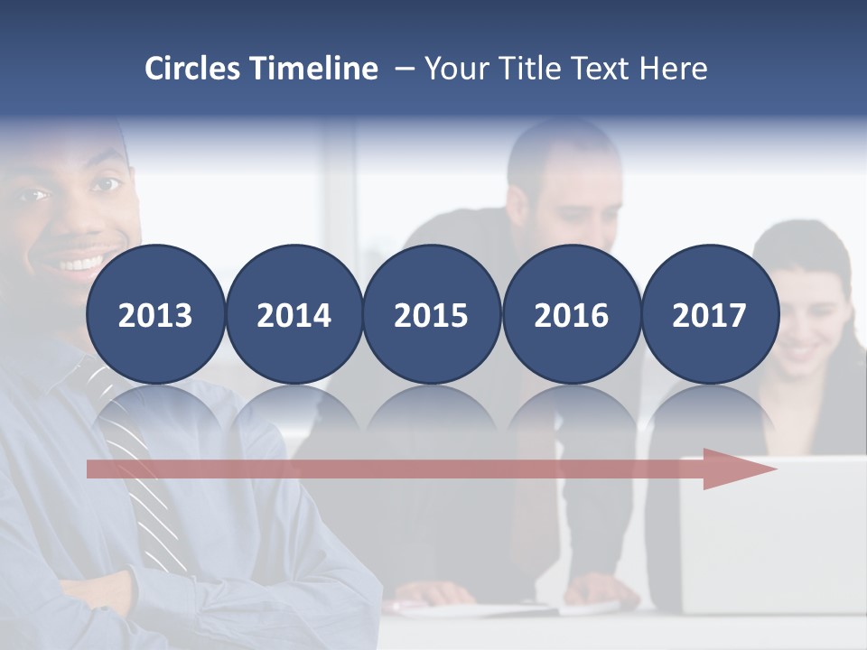 A Group Of People Sitting At A Table With A Laptop PowerPoint Template