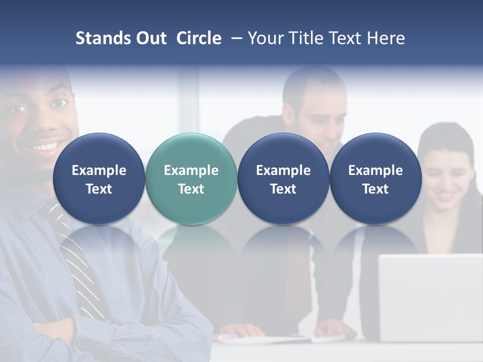 A Group Of People Sitting At A Table With A Laptop PowerPoint Template