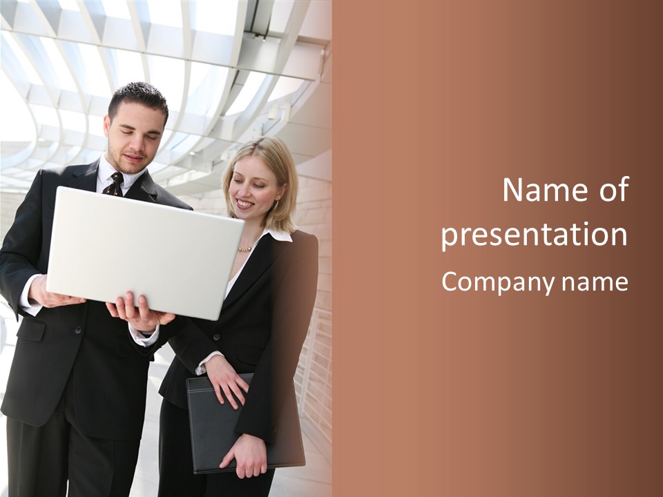 A Man And Woman In Business Attire Holding A Laptop PowerPoint Template