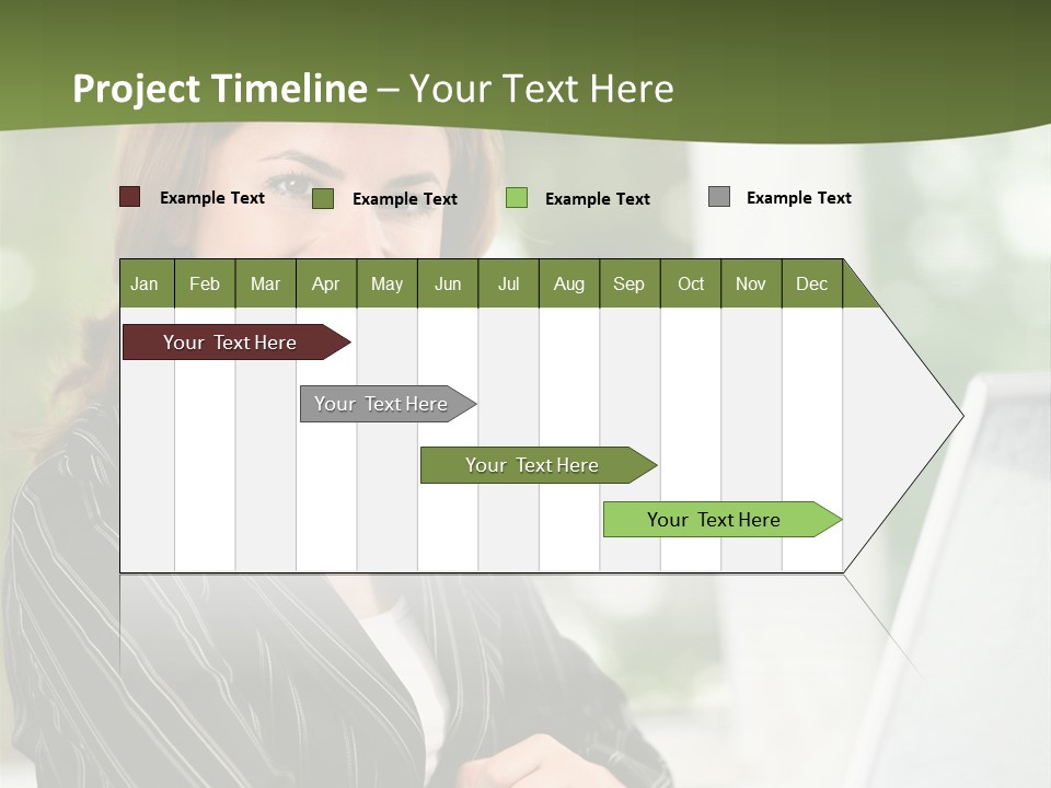 A Woman Sitting At A Desk With A Laptop PowerPoint Template