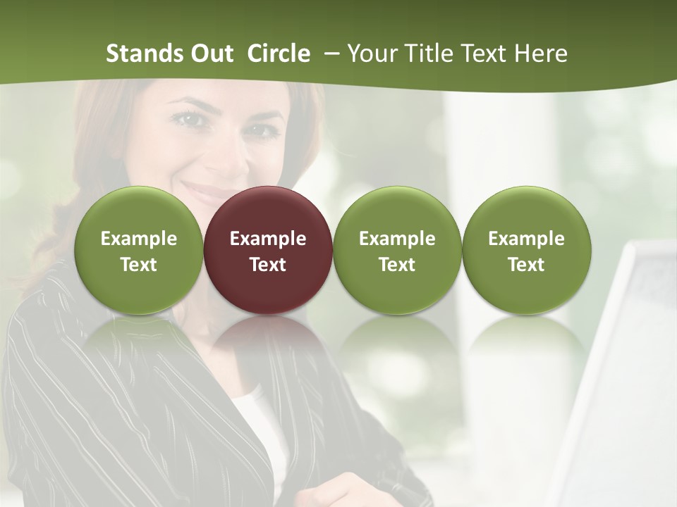 A Woman Sitting At A Desk With A Laptop PowerPoint Template